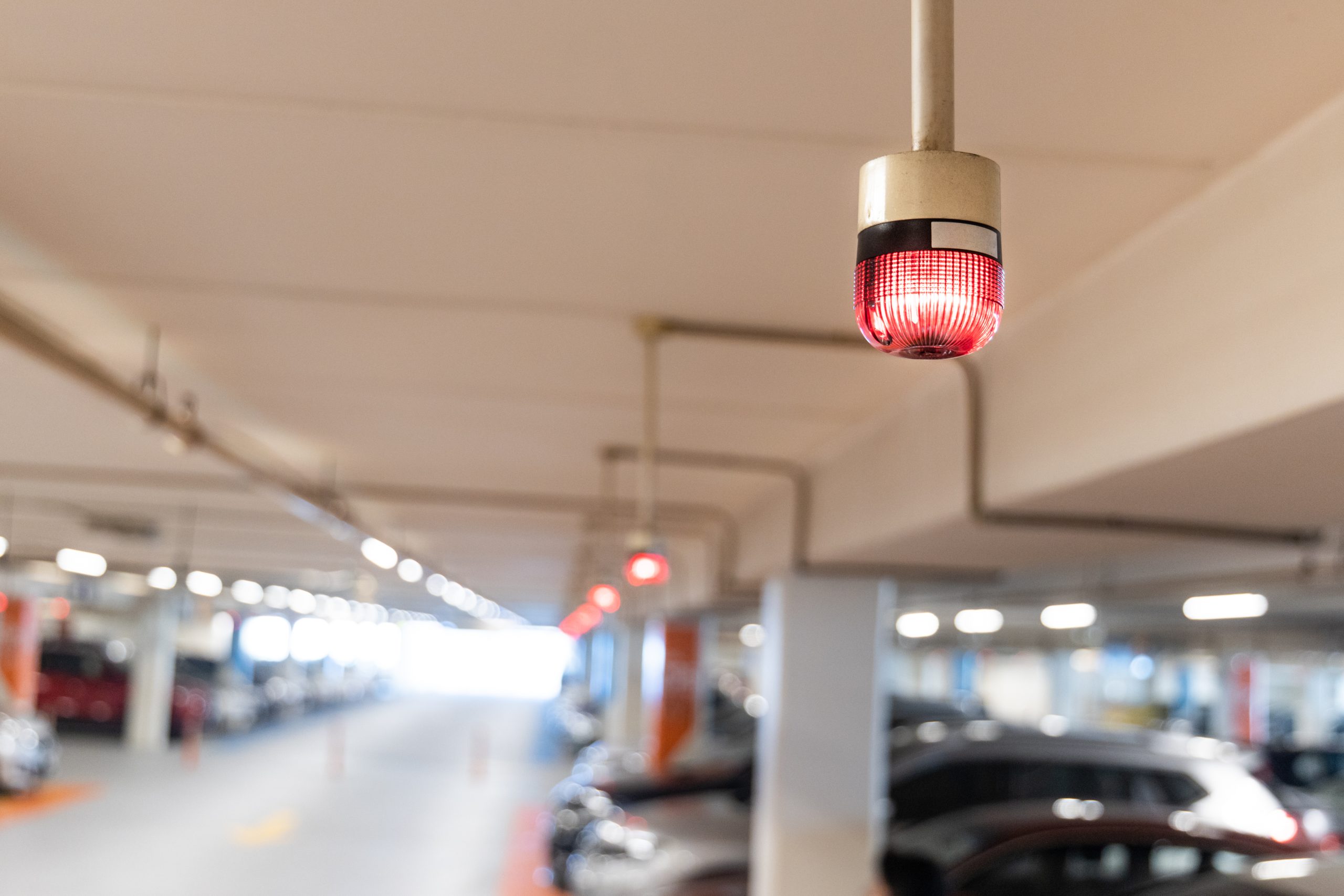 Smart car parking system with digital display showing available spaces